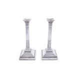 A PAIR OF SILVER CANDLESTICKS IN THE FORM OF CORINTHIAN COLUMNS, Sheffield c.1911, mark of
