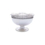 A LARGE SILVER BOWL, Sheffield c.1913, mark of John Round & Son Ltd, the raised wavy rim with