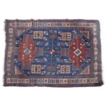 FINE KAZAK WOOL RUG, late 19th- early 20th century, rectangular field woven with geometric