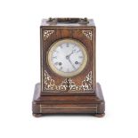 A ROSEWOOD AND MOTHER OF PEARL INLAID MANTLE CLOCK, of rectangular shape surmounted with ormolu