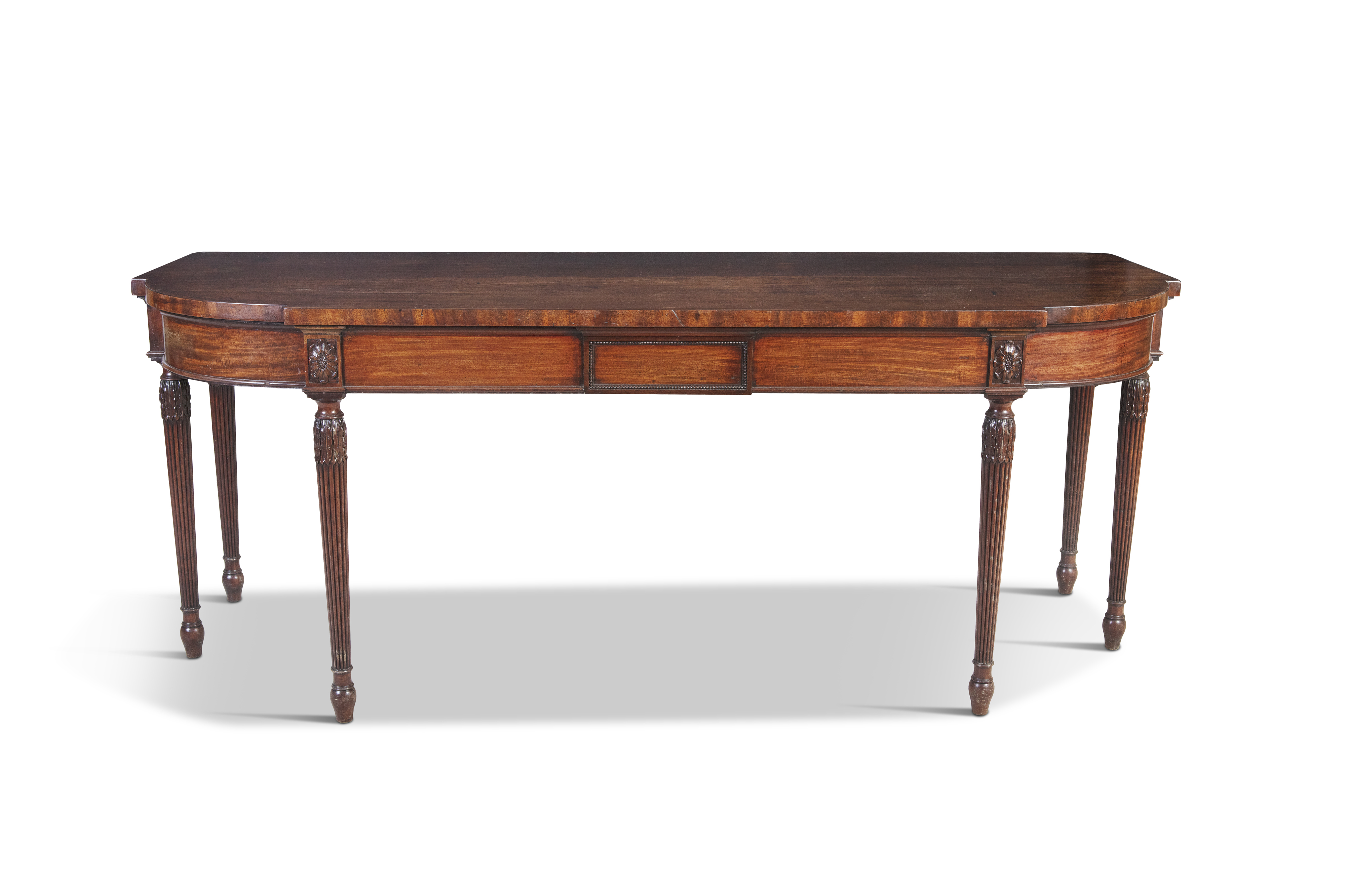 A GEORGE IV MAHOGANY BOWFRONT SERVING TABLE, the frieze centred by a beaded rectangular panel,