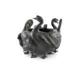 A LARGE JAPANESE BRONZE JARDINNERE, Meiji Period (1868 - 1912), cast with swans in relief, with seal