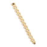 A GOLD BRACELET, composed of polished reeded links, in 18K gold length 20cm