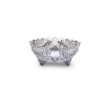 A VICTORIAN SILVER FRUIT BOWL, London c.1897, mark of Harry Brasted, of shaped oval form, the