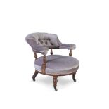 A VICTORIAN MAHOGANY FRAMED BUTTON BACK TUB ARMCHAIR, upholstered in grey with padded armrests,