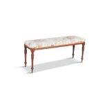 A WILLIAM IV MAHOGANY FRAMED LONG STOOL/ WINDOW SEAT, upholstered in floral fabric, raised on on