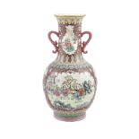 A LARGE DECORATIVE FAMILLE ROSE VASE, China, 20th century, of baluster shape with flared rim and