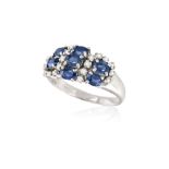 A SAPPHIRE AND DIAMOND DRESS RING, mounted in 18K gold, ring size N