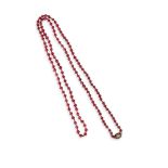A GLASS BEAD NECKLACE OF RED COLOUR WITH GARNET AND SEED PEARL GOLD CLASP, 9cts, chain length 96cm