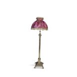 A CAST BRASS STANDARD LAMP, in the form of a Corinthian column raised on a square stepped base and