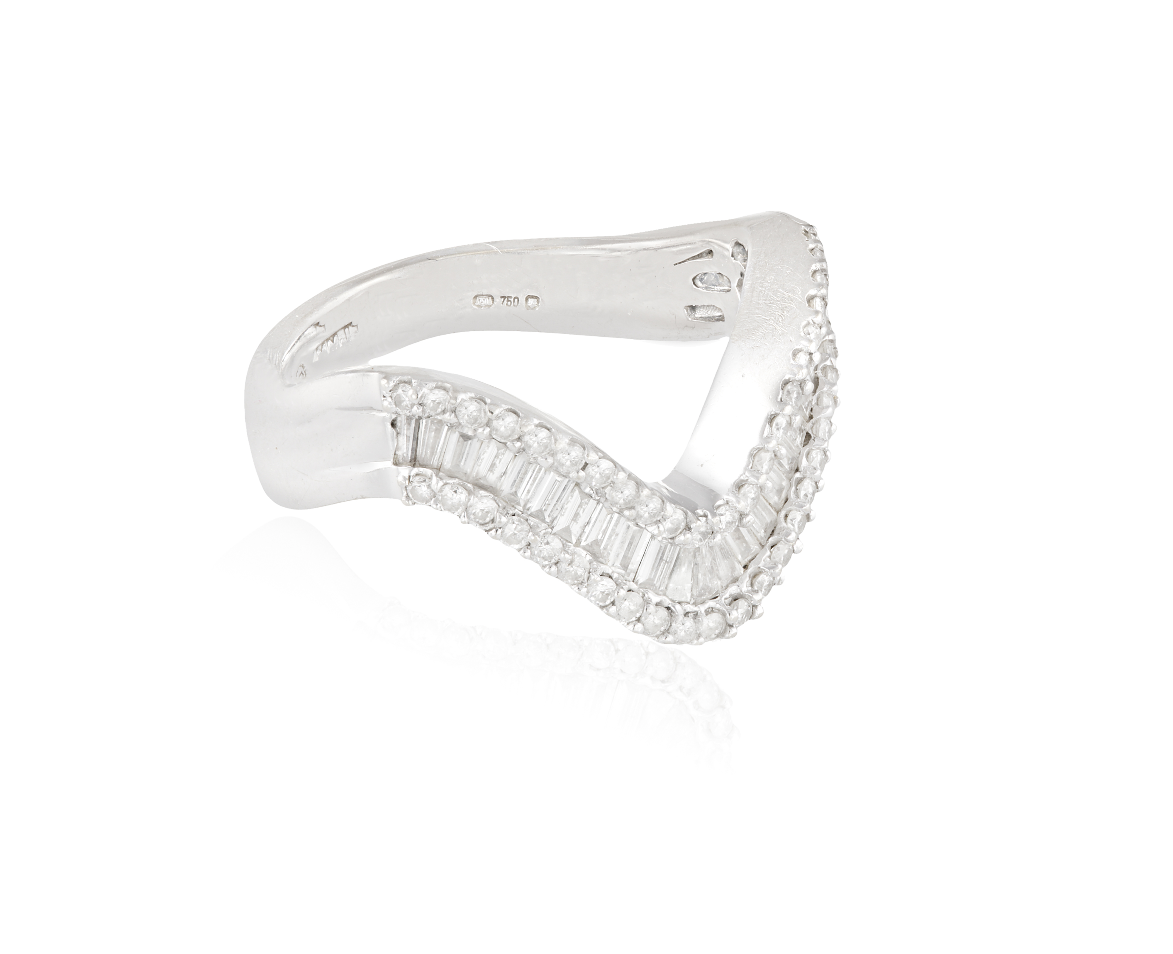 A DIAMOND DRESS RING, set with a row of baguette-cut diamond between round brilliant-cut diamond