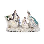 DRESDEN FIGURAL PORCELAIN GROUP, comprising two ladies, a gentleman and three children on an