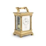A 19TH CENTURY FRENCH GILT METAL CARRIAGE CLOCK, the rectangular case surmounted by a swing