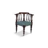 A VICTORIAN MAHOGANY FRAMED CORNER CHAIR, the bowed back with turned supports, the seat