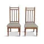 A PAIR OF WALNUT BOBBIN TURNED TALL BACK BEDROOM CHAIRS, 19th century, each with three bar-back,