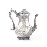 A VICTORIAN BRITANNIA STANDARD SILVER COFFEE POT, London 1876, mark of Martin Hall & Co., of