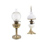 A LATE 19TH CENTURY BRASS OIL LAMP, with reeded column on circular platform base and with etched