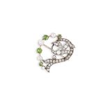 A VICTORIAN DIAMOND AND PERIDOT BROOCH, mounted in silver and gold, length 3cm