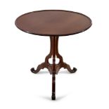 A LATE 19TH CENTURY MAHOGANY CIRCULAR TILT-TOP SUPPER TABLE, with cavetto rim and raised on a