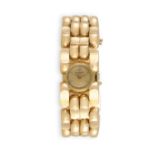 A LADY'S 18K GOLD MANUAL WIND RETRO BRACELET WATCH, BY UNIVERSAL, CIRCA 1940The Cal. 244 manual wind