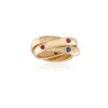 A RUBY, SAPPHIRE AND DIAMOND 'TRINITY' RING, BY CARTIER, 1995The interlocking bands accented at