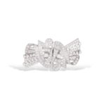 A DIAMOND DOUBLE-CLIP BROOCH, CIRCA 1950, FRENCHOf scrolling design, issuing sprays of brilliant,