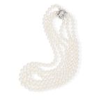 A CULTURED PEARL AND DIAMOND NECKLACEComposed of three rows of graduated cultured pearls of white