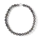 A CULTURED PEARL NECKLACEThe single row of Tahitian pearl of grey tint, measuring approximately 12.