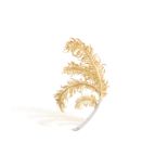 A GOLD AND DIAMOND BROOCH, CIRCA 1960Designed as a stylised feather spray, embellished with a