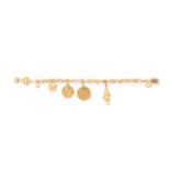 A GEM-SET AND GOLD CHARM BRACELET, CIRCA 1955-60The oval-link bracelet with reeded details,