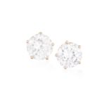 A FINE PAIR OF DIAMOND EARSTUDSEach brilliant-cut diamond within a five-claw setting, weighing 2.