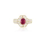 A RUBY AND DIAMOND RINGThe oval-shaped ruby within collet-setting, within an openwork frame and