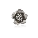 A DIAMOND AND TITANIUM RING, BY MARGHERITA BURGENERDesigned as a flowerhead, the textured grey