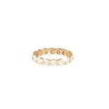 A DIAMOND ETERNITY RINGThe continuous row of round brilliant-cut diamonds interspersed by gold