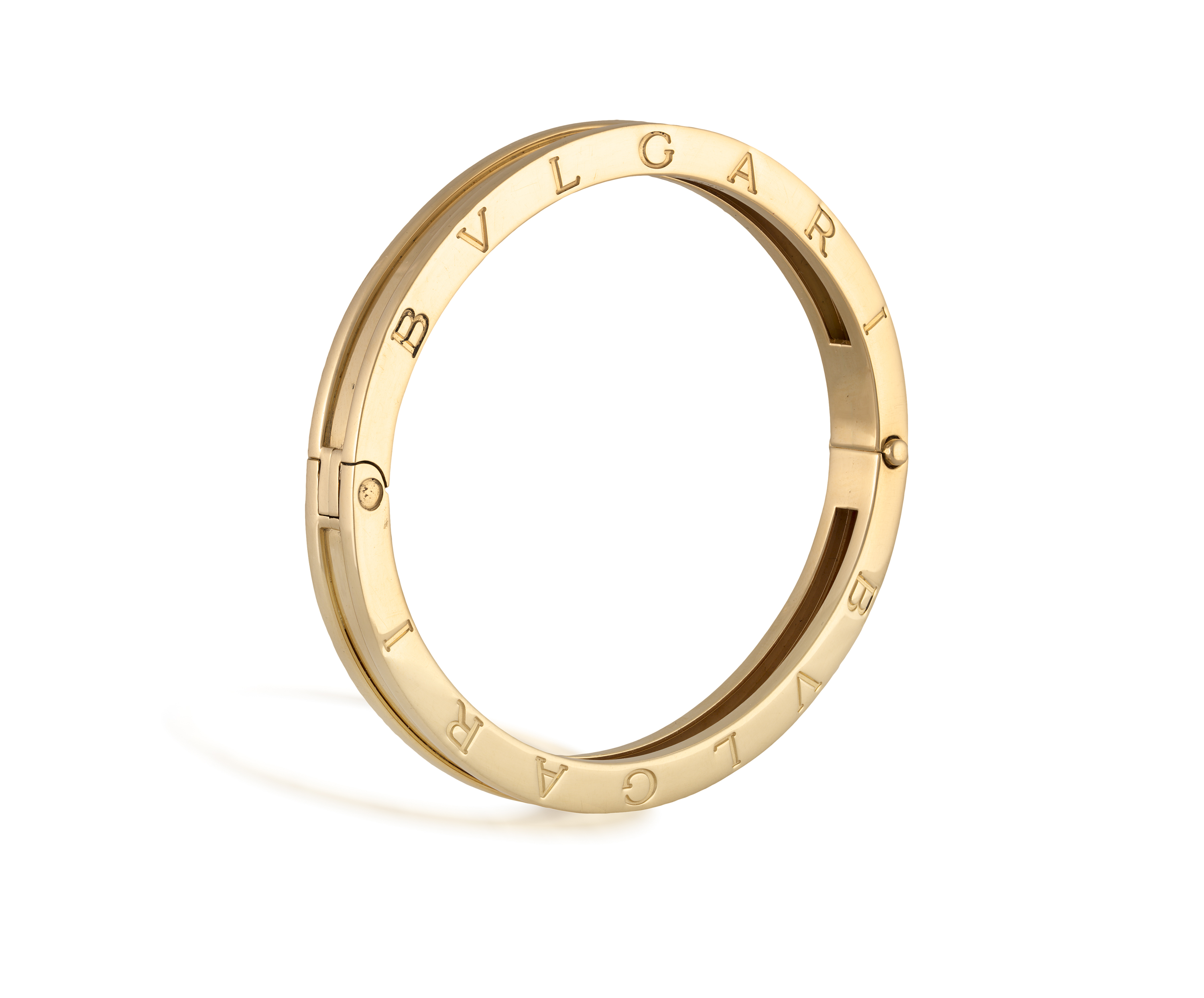 A 'B.ZERO' GOLD BANGLE, BY BULGARIThe polished ridged bangle with BVLGARI engraved around both