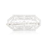 AN ELEGANT ART DECO DIAMOND BROOCH, CIRCA 1925The openwork geometric plaque set throughout with