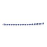 A SAPPHIRE AND DIAMOND BRACELETComposed of a series of rectangular step-cut sapphires, each