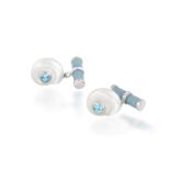 A PAIR OF SHELL AND TOPAZ CUFFLINKS, BY TRIANONEach umbonium shell with circular-cut blue topaz at