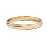 A 'TRINITY' BANGLE, BY CARTIERComposed of seven interlocking tri-coloured bangles, in 18K gold,