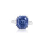 A SAPPHIRE AND DIAMOND DRESS RINGThe octagonal-shaped sapphire weighing approximately 16.30cts,