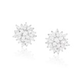 AN IMPORTANT PAIR OF DIAMOND EARCLIPSComposed of a large cluster of pear and marquise-shaped