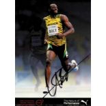 Autograph Olympic Champion athletics. Usain Bolt - Colour autograph card "Puma" from 2014 signed