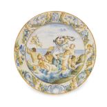 Plato de cerámica esmaltada con escena mitológica, Castelli, S. XIX Medidas: 55 x 54,5 cm