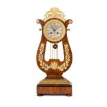 Reloj de sobremesa Carlos X en forma de lira en madera de caoba con aplicaciones de bronce cincelado