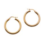 Pendientes criollas circulares de perfil tubular En oro amarillo de 18K. Diámetro: 2,7 cm.