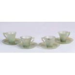 Cuatro tazas de jade o jadeita, China, años 30-40. Medidas tazas 5 cm Diámetro platos 11 cm
