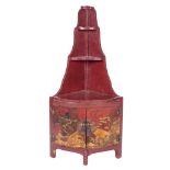 Mueble esquinero lacado en rojo, China  Medidas: 126 x 44 x 60 cm.