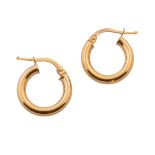 Pendientes criolla de perfil tubular En oro amarillo de 18K. Diámetro: 1,6 cm.