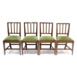 A set of four Georgian rail-back dining chairs with padded drop-in seats, & on square tapered legs