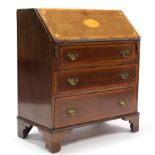A 19th century inlaid-mahogany small bureau with fitted interior enclosed by fall-front above